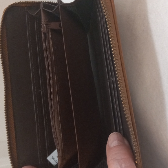 Tan Wallet with Elliptical Cutout W/Shimmering design behind - Picture 5 of 6